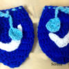Gants le ton du bleu avec arc blanc au crochet