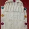 Nid d'ange bébé blanc au crochet aux boutons