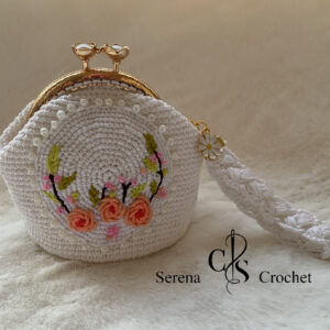 Porte-monnaie en crochet en motif floral brodé